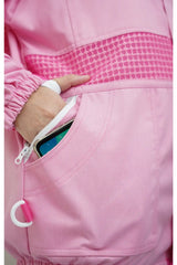 Close-up of the side zip pocket holding a smartphone on the pink poly cotton semi ventilated beekeeping jacket