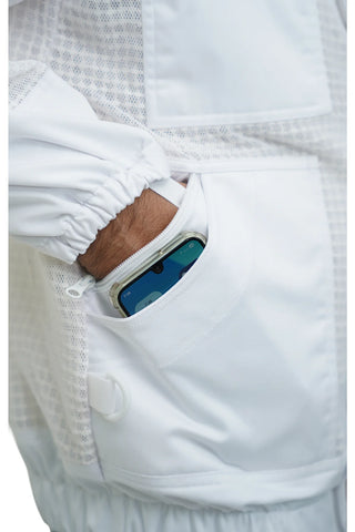 Close-up of the side zip pocket holding a smartphone on the 3 layer ventilated mesh beekeeping jacket