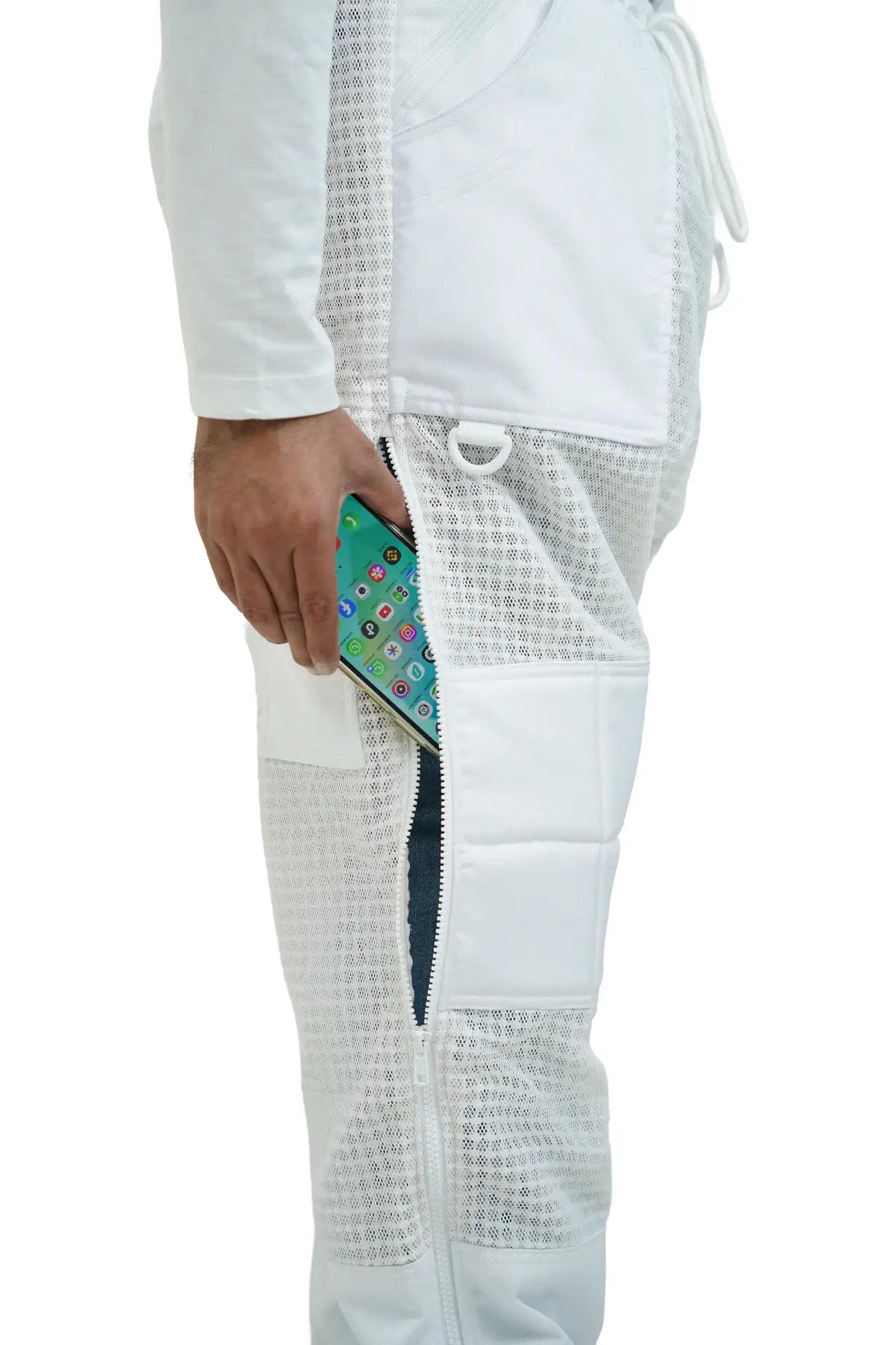 Close-up of the thigh zip pocket holding a smartphone on the 3 layer ventilated mesh beekeeping trousers