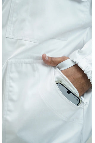  Close-up of large lower pocket on white beekeeping jacket holding a smartphone