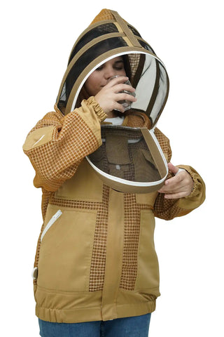 Beekeeper drinking water through the round veil of the khaki 3 layer ventilated mesh beekeeping jacket
