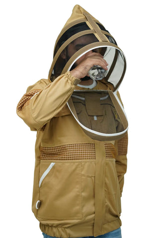Beekeeper drinking water through the round veil of the khaki poly cotton semi ventilated beekeeping jacket