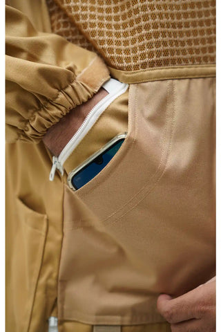 Close-up of the pocket and mesh ventilation panel on the khaki poly cotton semi ventilated beekeeping suit