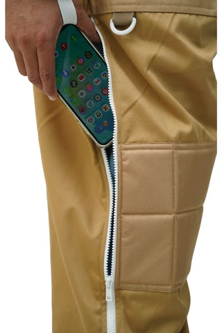 Close-up of the thigh zip pocket holding a smartphone on the khaki poly cotton semi ventilated beekeeping suit
