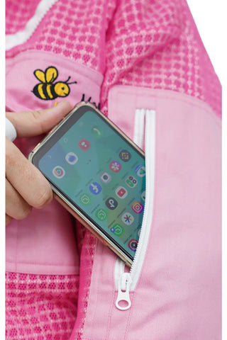 
Close-up of the zip pocket holding a smartphone on the pink 3 layer ventilated mesh beekeeping jacket and trouser set
