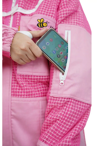 Close-up of the side zip pocket holding a smartphone on the pink 3 layer ventilated mesh beekeeping suit