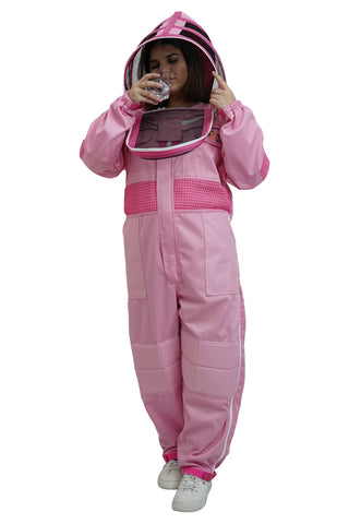 Beekeeper drinking water through the round veil of the pink poly cotton semi ventilated beekeeping suit
