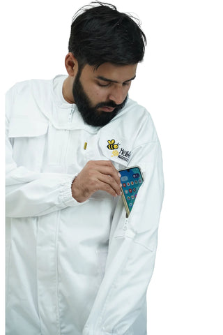 Close-up of the chest pocket holding a smartphone on the poly cotton beekeeping suit