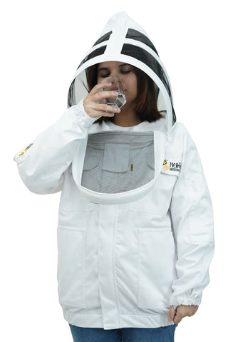 Female beekeeper drinking water with fencing veil flipped open on white poly-cotton beekeeping jacket